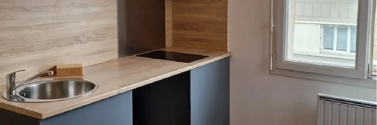 photo-longue-realisation-14 photo de la cuisine une fois l'appartement de Coutances rénové